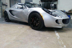 David Came In and wanted his Lotus To have a more custom look so we repaired and powdercoated his rims with a High Gloss black Here the final Product